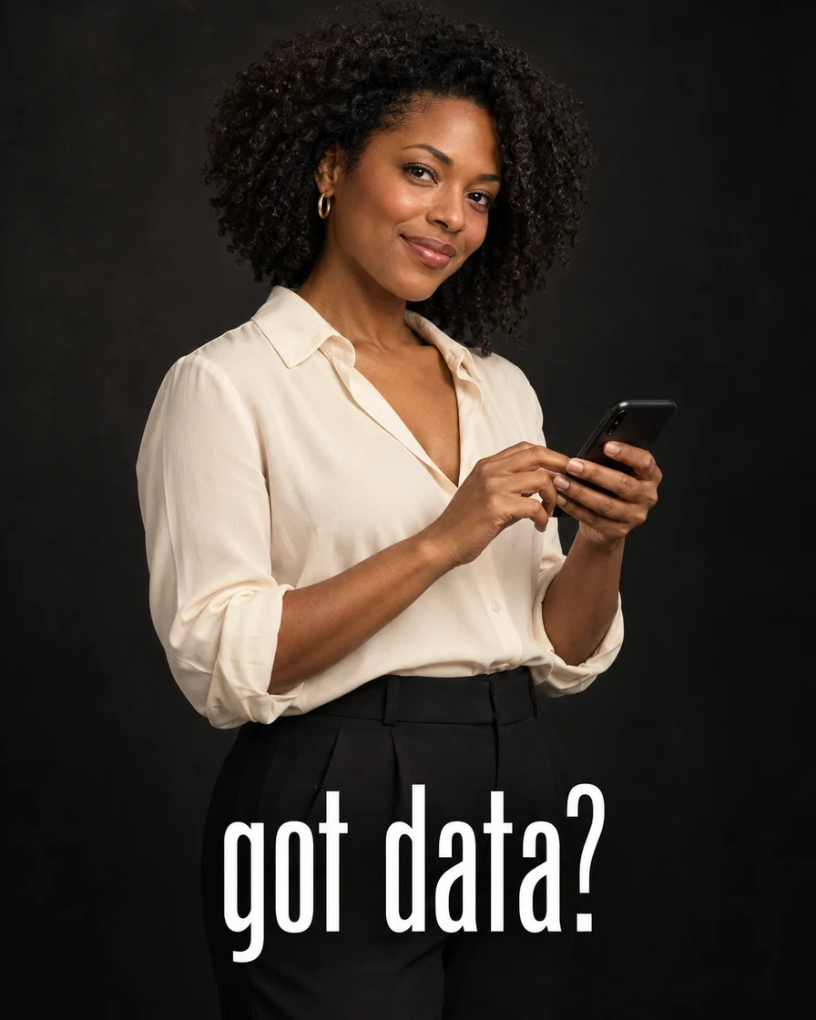 A smiling woman holds a phone above the words got data?